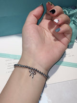 18K T Bow Charm Bead Bracelet