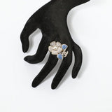 18K CC Camelia Blue Diamond Ring