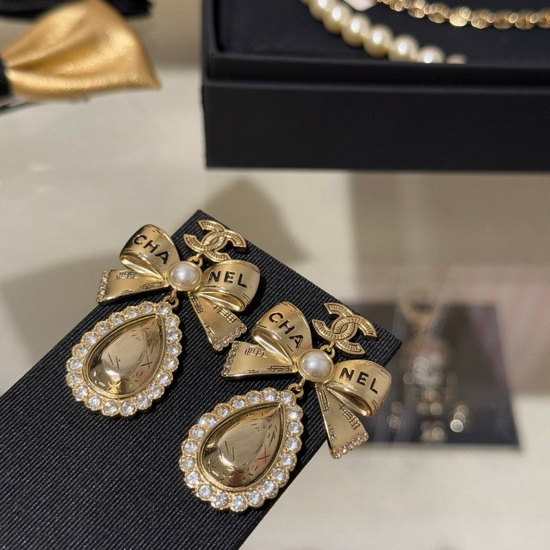 18K CC 25K Golden Bow Earrings