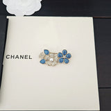 18K CC Blue Flower Diamond Brooch