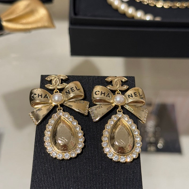 18K CC 25K Golden Bow Earrings