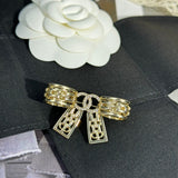 18K CC 25K Bow Tie Diamond Gold Brooch