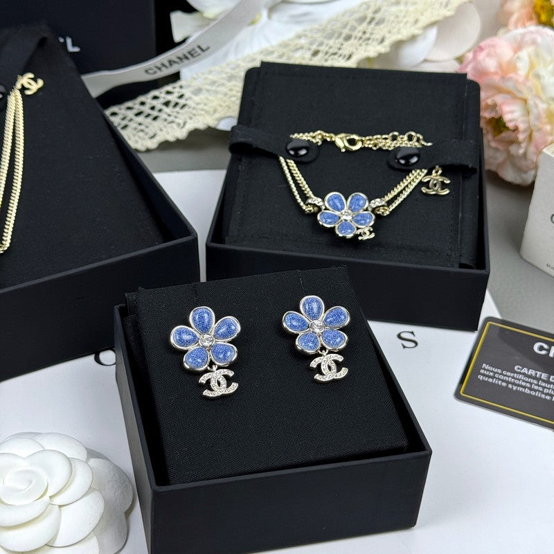 18K CC 26C Blue Flower Diamond Earrings