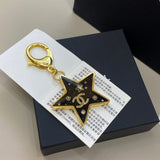 18K CC Black Gold Star Brooch