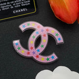 18K CC Pink & Black Star Brooch