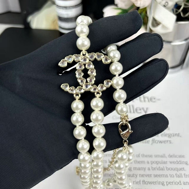 18K CC 25B Long Pearls Necklace