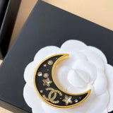 18K CC 25K Black Moon Brooch
