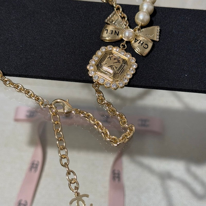 18K CC 25K Butterfly Pearl Necklace